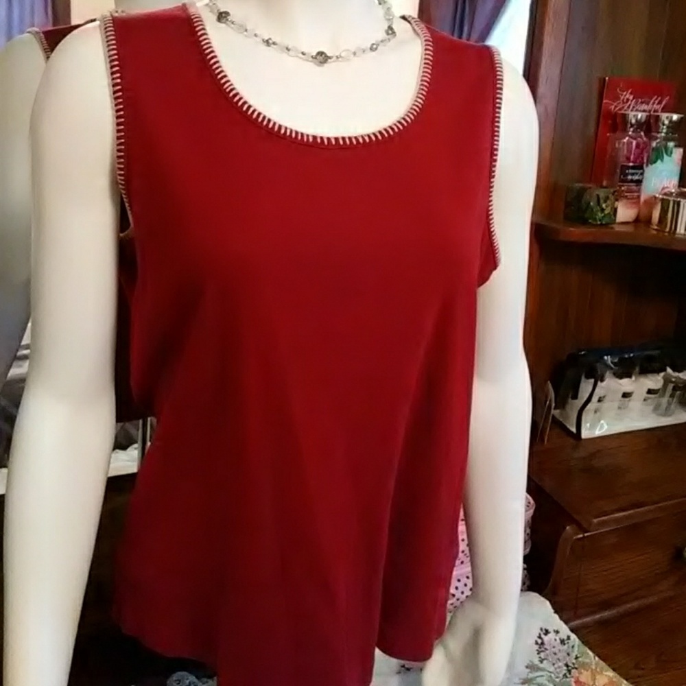 Red top with white stitch